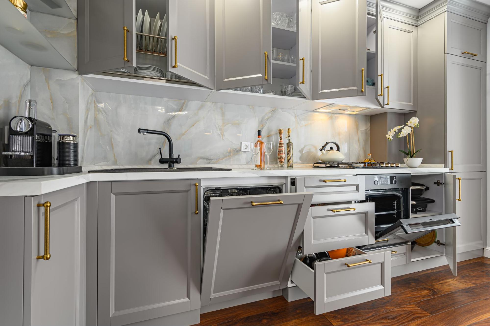 Detailed view of open cabinets in a grey and white modern classic kitchen.
